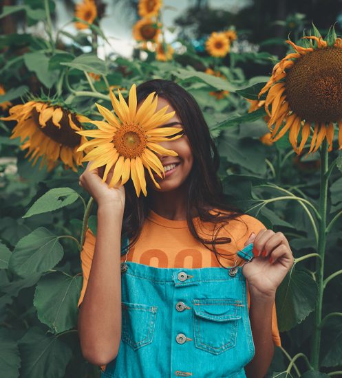 Woman with sunflowers