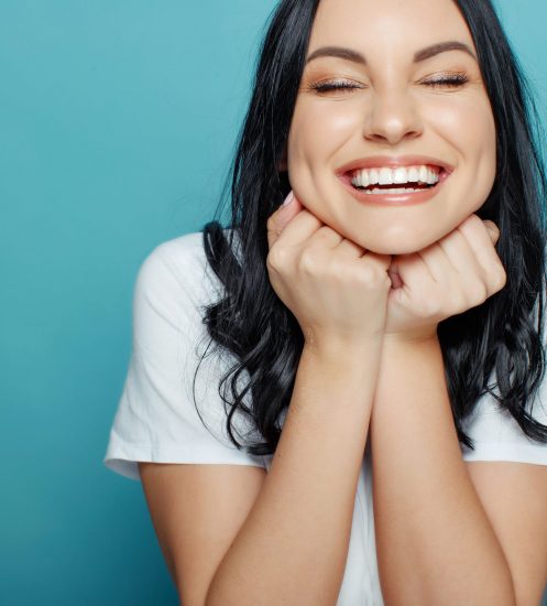 Woman smiling after dental treatment